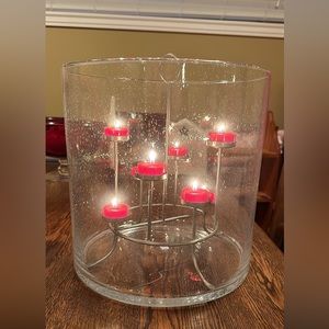 Partlylite hurricane with tea light tree included. No candles.